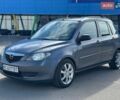 Серый Мазда 2, объемом двигателя 1.4 л и пробегом 254 тыс. км за 3500 $, фото 1 на Automoto.ua