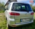 Серый Мазда 2, объемом двигателя 1.4 л и пробегом 290 тыс. км за 3900 $, фото 7 на Automoto.ua