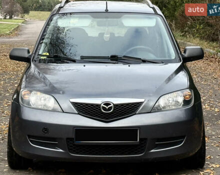 Серый Мазда 2, объемом двигателя 1.4 л и пробегом 247 тыс. км за 3350 $, фото 3 на Automoto.ua