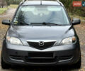 Серый Мазда 2, объемом двигателя 1.4 л и пробегом 247 тыс. км за 3350 $, фото 3 на Automoto.ua