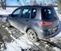 Сірий Мазда 2, об'ємом двигуна 1.4 л та пробігом 253 тис. км за 3300 $, фото 3 на Automoto.ua