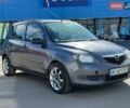 Серый Мазда 2, объемом двигателя 1.4 л и пробегом 254 тыс. км за 3800 $, фото 1 на Automoto.ua