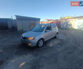 Серый Мазда 2, объемом двигателя 1.4 л и пробегом 245 тыс. км за 1399 $, фото 5 на Automoto.ua