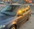 Серый Мазда 2, объемом двигателя 1.4 л и пробегом 202 тыс. км за 2300 $, фото 5 на Automoto.ua