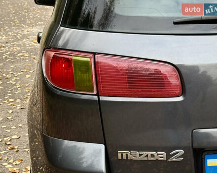 Серый Мазда 2, объемом двигателя 1.4 л и пробегом 247 тыс. км за 3350 $, фото 12 на Automoto.ua