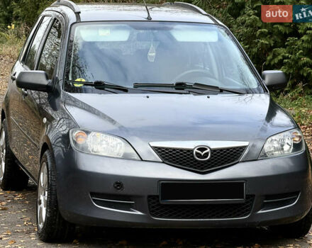Серый Мазда 2, объемом двигателя 1.4 л и пробегом 247 тыс. км за 3350 $, фото 2 на Automoto.ua