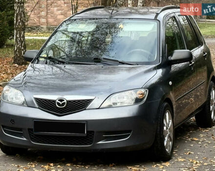Серый Мазда 2, объемом двигателя 1.4 л и пробегом 247 тыс. км за 3350 $, фото 4 на Automoto.ua