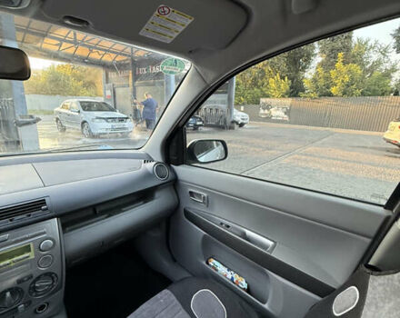 Серый Мазда 2, объемом двигателя 1.39 л и пробегом 126 тыс. км за 4700 $, фото 35 на Automoto.ua