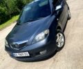 Серый Мазда 2, объемом двигателя 1.4 л и пробегом 230 тыс. км за 3300 $, фото 1 на Automoto.ua