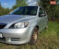 Серый Мазда 2, объемом двигателя 1.4 л и пробегом 290 тыс. км за 3900 $, фото 1 на Automoto.ua