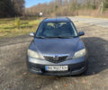 Серый Мазда 2, объемом двигателя 1.4 л и пробегом 173 тыс. км за 3500 $, фото 1 на Automoto.ua