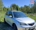 Серый Мазда 2, объемом двигателя 1.39 л и пробегом 334 тыс. км за 2800 $, фото 1 на Automoto.ua