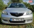 Серый Мазда 2, объемом двигателя 1.4 л и пробегом 290 тыс. км за 3900 $, фото 1 на Automoto.ua