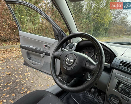 Серый Мазда 2, объемом двигателя 1.4 л и пробегом 247 тыс. км за 3350 $, фото 24 на Automoto.ua