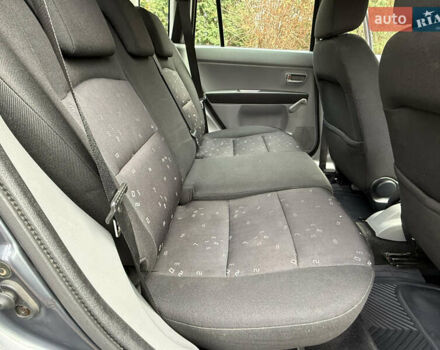 Серый Мазда 2, объемом двигателя 1.4 л и пробегом 247 тыс. км за 3350 $, фото 25 на Automoto.ua