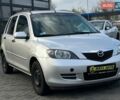 Серый Мазда 2, объемом двигателя 1.39 л и пробегом 130 тыс. км за 4300 $, фото 1 на Automoto.ua