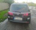 Сірий Мазда 2, об'ємом двигуна 1.4 л та пробігом 12 тис. км за 2506 $, фото 4 на Automoto.ua