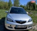 Серый Мазда 2, объемом двигателя 1.39 л и пробегом 334 тыс. км за 2800 $, фото 1 на Automoto.ua