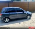 Серый Мазда 2, объемом двигателя 1.4 л и пробегом 230 тыс. км за 3300 $, фото 2 на Automoto.ua