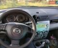 Серый Мазда 2, объемом двигателя 1.4 л и пробегом 290 тыс. км за 3900 $, фото 11 на Automoto.ua