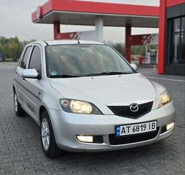 Сірий Мазда 2, об'ємом двигуна 1.4 л та пробігом 226 тис. км за 3950 $, фото 2 на Automoto.ua