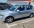 Серый Мазда 2, объемом двигателя 1.4 л и пробегом 166 тыс. км за 3900 $, фото 2 на Automoto.ua