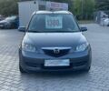 Сірий Мазда 2, об'ємом двигуна 1.4 л та пробігом 192 тис. км за 4600 $, фото 1 на Automoto.ua