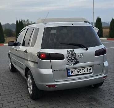 Сірий Мазда 2, об'ємом двигуна 1.4 л та пробігом 226 тис. км за 3950 $, фото 18 на Automoto.ua