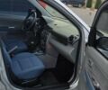 Сірий Мазда 2, об'ємом двигуна 1.4 л та пробігом 226 тис. км за 3950 $, фото 19 на Automoto.ua