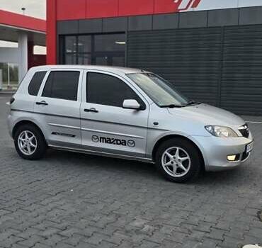 Сірий Мазда 2, об'ємом двигуна 1.4 л та пробігом 226 тис. км за 4350 $, фото 9 на Automoto.ua