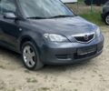Серый Мазда 2, объемом двигателя 1.4 л и пробегом 180 тыс. км за 3900 $, фото 6 на Automoto.ua