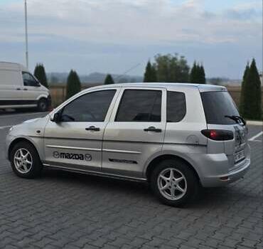 Сірий Мазда 2, об'ємом двигуна 1.4 л та пробігом 226 тис. км за 3950 $, фото 16 на Automoto.ua