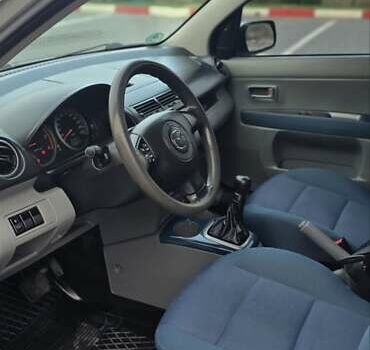 Сірий Мазда 2, об'ємом двигуна 1.4 л та пробігом 226 тис. км за 3950 $, фото 23 на Automoto.ua