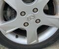 Серый Мазда 2, объемом двигателя 1.4 л и пробегом 180 тыс. км за 3900 $, фото 7 на Automoto.ua