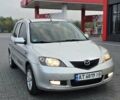 Сірий Мазда 2, об'ємом двигуна 1.4 л та пробігом 226 тис. км за 4350 $, фото 8 на Automoto.ua