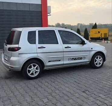 Сірий Мазда 2, об'ємом двигуна 1.4 л та пробігом 226 тис. км за 3950 $, фото 5 на Automoto.ua