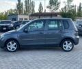 Сірий Мазда 2, об'ємом двигуна 1.4 л та пробігом 192 тис. км за 4600 $, фото 3 на Automoto.ua