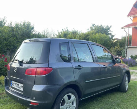 Сірий Мазда 2, об'ємом двигуна 1.39 л та пробігом 106 тис. км за 4600 $, фото 4 на Automoto.ua