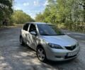 Серый Мазда 2, объемом двигателя 1.4 л и пробегом 228 тыс. км за 3800 $, фото 5 на Automoto.ua