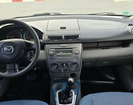 Сірий Мазда 2, об'ємом двигуна 1.4 л та пробігом 226 тис. км за 3950 $, фото 27 на Automoto.ua