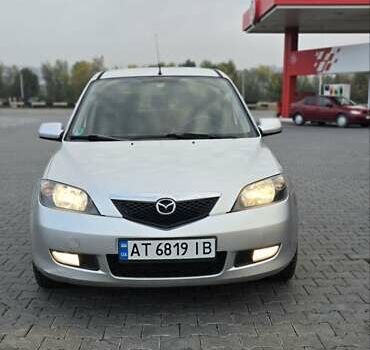 Сірий Мазда 2, об'ємом двигуна 1.4 л та пробігом 226 тис. км за 3950 $, фото 4 на Automoto.ua