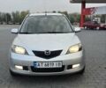 Сірий Мазда 2, об'ємом двигуна 1.4 л та пробігом 226 тис. км за 3950 $, фото 4 на Automoto.ua