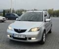Сірий Мазда 2, об'ємом двигуна 1.4 л та пробігом 226 тис. км за 4350 $, фото 5 на Automoto.ua