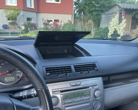 Сірий Мазда 2, об'ємом двигуна 1.39 л та пробігом 106 тис. км за 4600 $, фото 19 на Automoto.ua