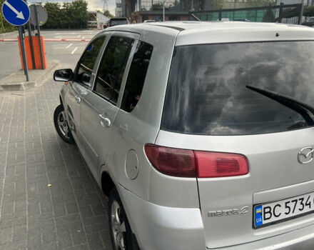 Сірий Мазда 2, об'ємом двигуна 1.4 л та пробігом 340 тис. км за 2600 $, фото 4 на Automoto.ua