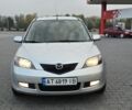 Сірий Мазда 2, об'ємом двигуна 1.4 л та пробігом 227 тис. км за 3950 $, фото 2 на Automoto.ua