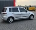 Сірий Мазда 2, об'ємом двигуна 1.4 л та пробігом 226 тис. км за 4350 $, фото 4 на Automoto.ua