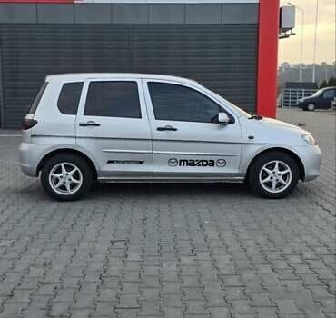 Сірий Мазда 2, об'ємом двигуна 1.4 л та пробігом 226 тис. км за 3950 $, фото 3 на Automoto.ua