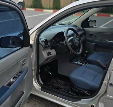 Сірий Мазда 2, об'ємом двигуна 1.4 л та пробігом 226 тис. км за 3950 $, фото 22 на Automoto.ua