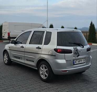 Сірий Мазда 2, об'ємом двигуна 1.4 л та пробігом 226 тис. км за 3950 $, фото 13 на Automoto.ua